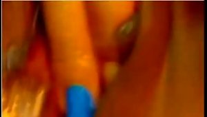 With Multi-colored Finger Nails A  Fingers Her  Hole