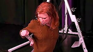 Redhead In Sweater Bound In Dungeon