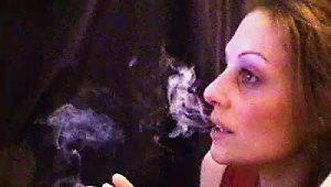 Webcam Girl Lights Up A Cigarette