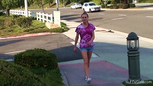 A Slim Girl Plays With Her Pink  In A  Park