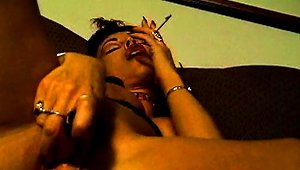 Smoking Brunette Enjoys Solo Masturbation