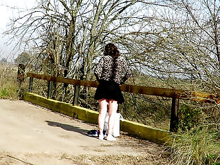 Patricia Undresses On The Outdoor Bridge