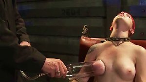 Kinky Redhead Gets Her Tits Pumped And Her  Tortured