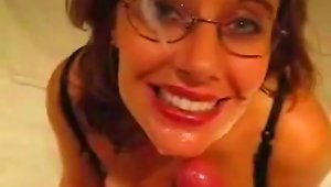 Brunette Takes Sperm Shot Over Her Glasses