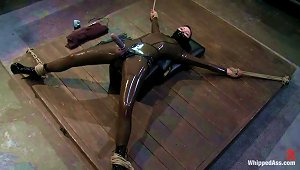 Submissive Girl In Latex Bodysuit Gets Punished By A Girl