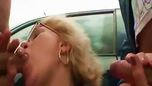 Blonde Granny With A Nice Body Is In A Threesome Outside And Fucking