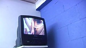 Masturbating Cougar Fingers Pussy And Gives Blowjob Through Gloryhole