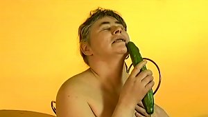 Lewd Granny Julie Moans Loudly While Fucking Her Vag With A Cucumber