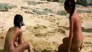 Naked Teens Fool Around On The Beach And Play With Each Other
