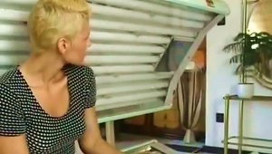 Busty Short-haired Blond MILF Enjoys Sex In A Solarium