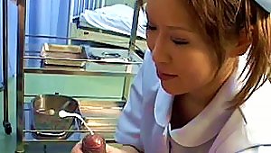Slutty Japanese Nurse Wanks A Patient's Cock Until It Cums