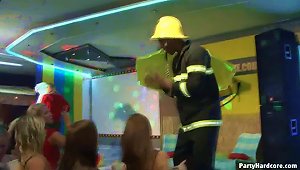 Fireman  Dances While..