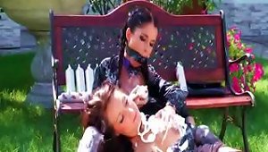 Lesbians In The Backyard With The Mistress Putting Cream On Slave